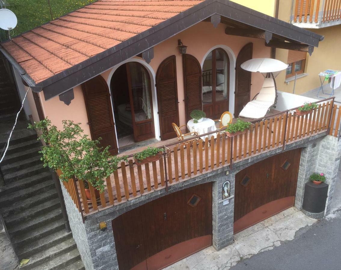 Chalet Con Piscina Garzeno Exterior foto